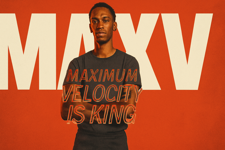 Young man with a serious expression and arms crossed in a dark T-shirt stands against a bold orange background with oversized cream letters, with neon-outlined text across him reading MAXIMUM VELOCITY IS KING.